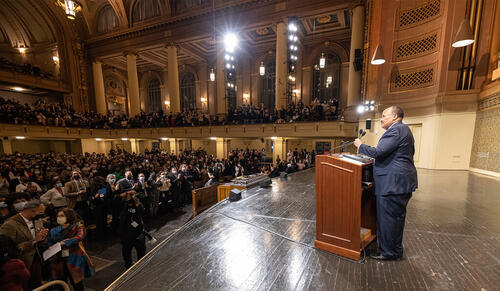 A photo of keynote speaker Martin Luther King III speaking to the audience at Woolsey H